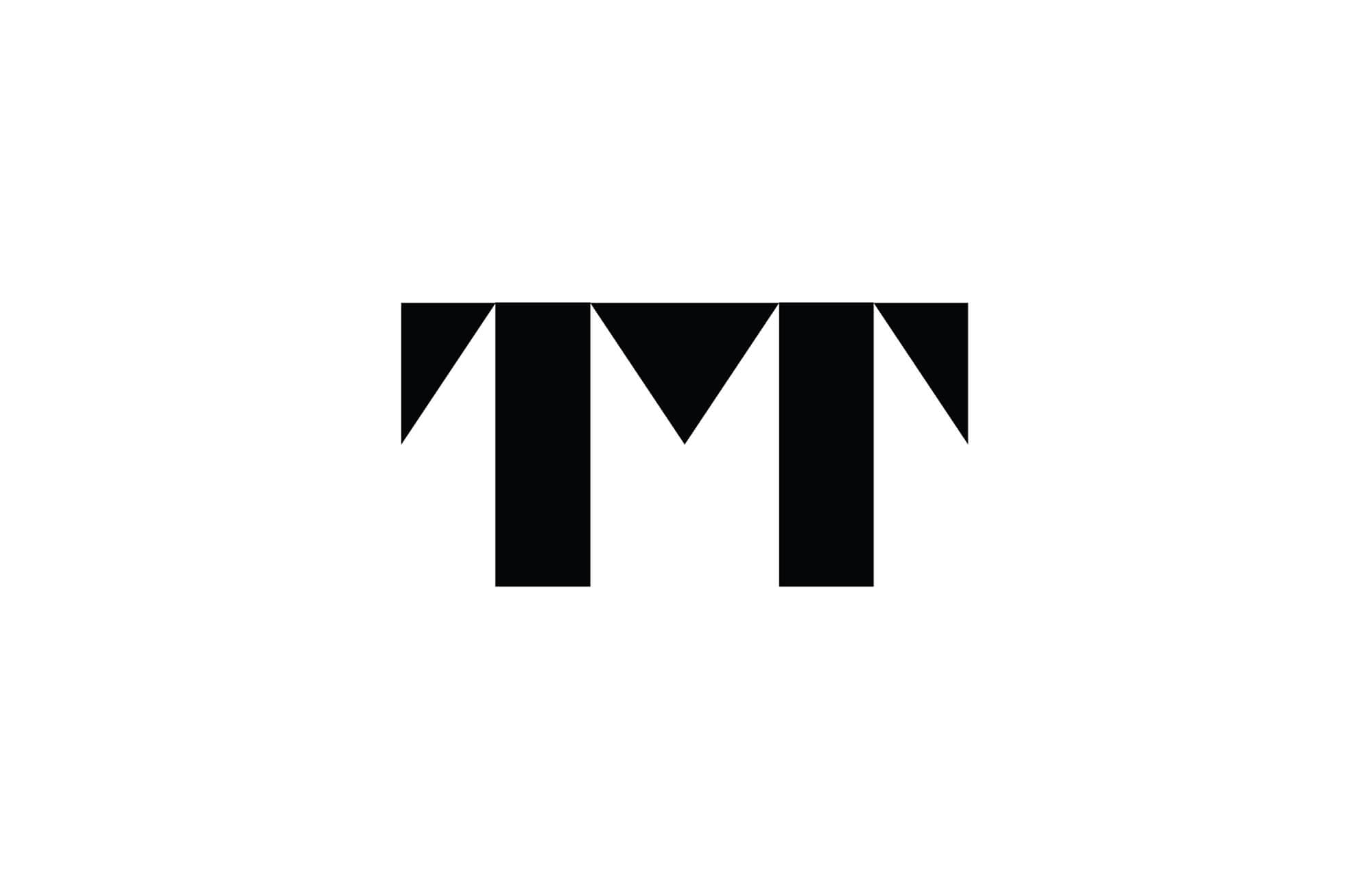 TMT, a logo design that combines the letters 'T' and 'M', creating a visual synergy that symbolizes creativity, innovation, and the balance between different aspects of the business.